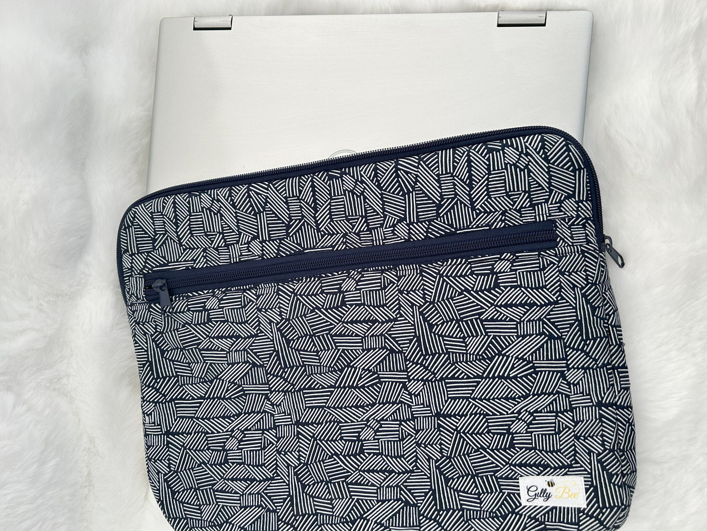 Navy Blue patterned Laptop sleeve on a white surface