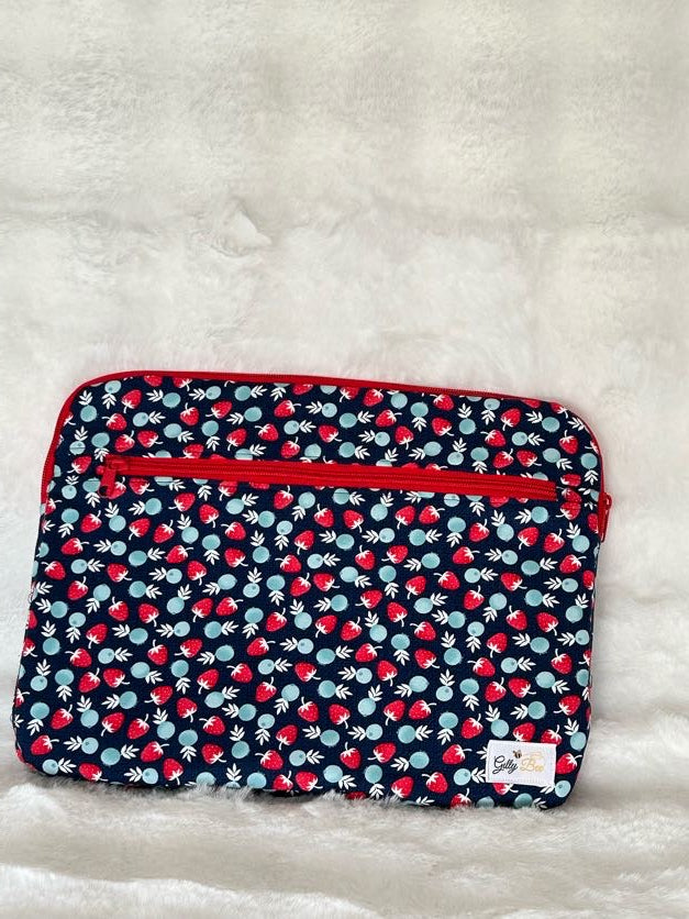 Strawberry fabric pouch with red zipper , zipper pocket and a visible gilly bee brand logo