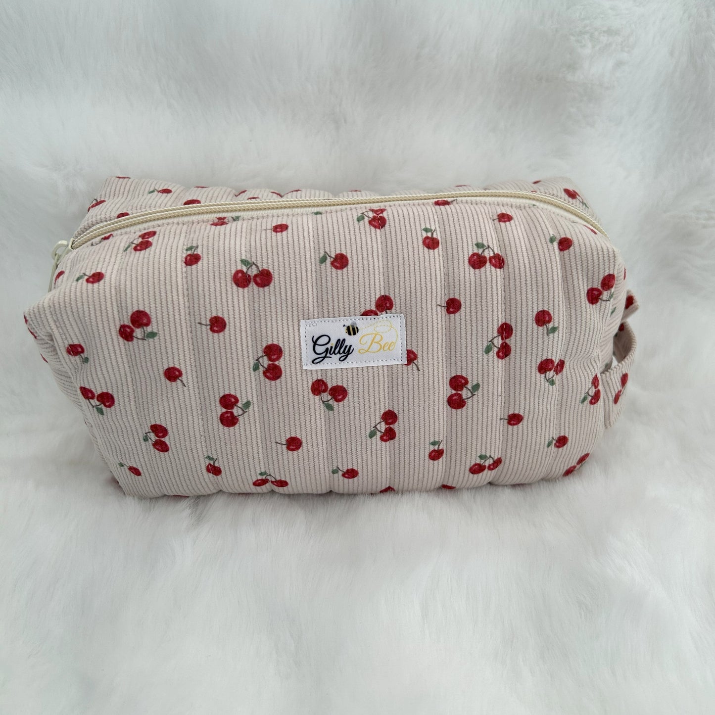 Quilted Make up pouch pouch with cherry pattern on a white background