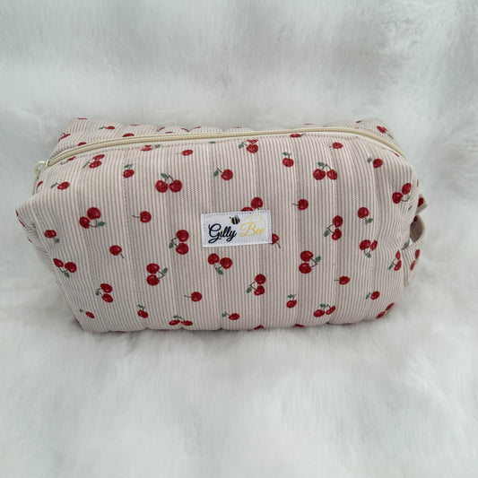 Quilted Make up pouch pouch with cherry pattern on a white background