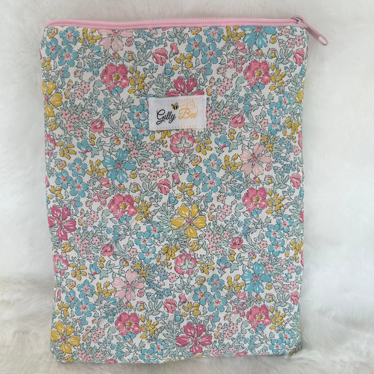 Liverty Floral patterned book sleeve with a visible Gilly Bee brand label on a white background