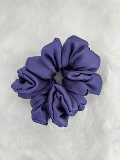 Blue Satin Scrunchie on a white background